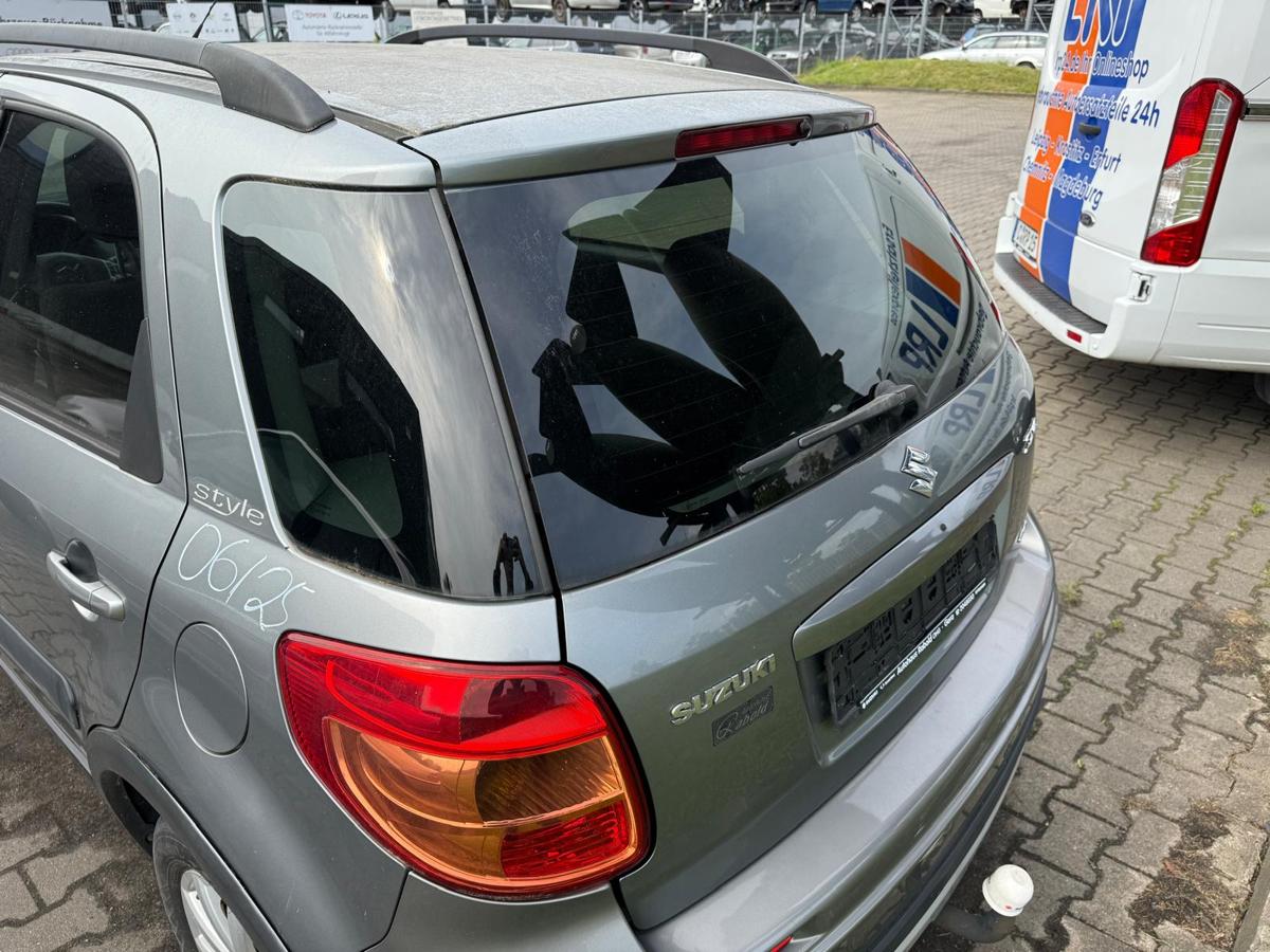 Suzuki SX4 EY original Heckklappe mit Scheibe ZCD Galactic Grey Rohbau BJ11